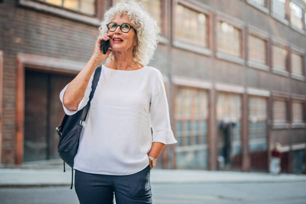 istock Lady talking on mobile on the street 1193517147