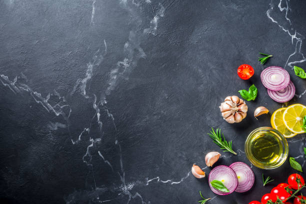 istock Cooking background with vegetables and herbs 1193522319