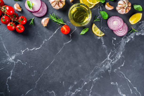 istock Cooking background with vegetables and herbs 1193522351