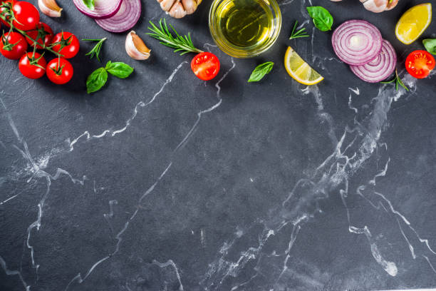 istock Cooking background with vegetables and herbs 1193522454