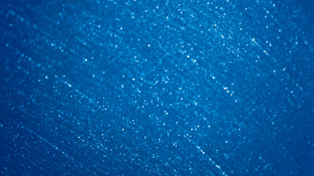 azul clásico brillo gasa navidad fondo viñeta de color de moda del año 2020 tul netting desenfocado patrón marino textura macro fotografía - star trail galaxy pattern star fotografías e imágenes de stock