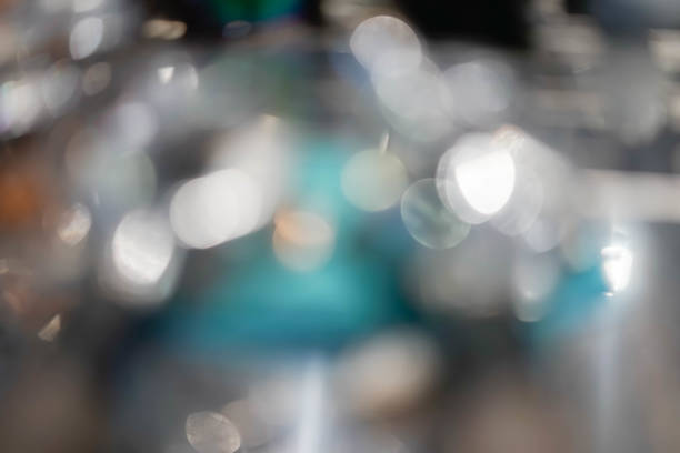istock blur background with white bokeh and bright white lights 1193523660