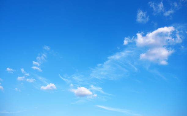 istock Light cumulus clouds in the blue sky 1193526157