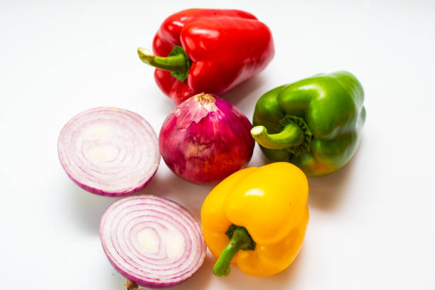 Colorful various healthy eat fresh tropical vegetable on white background