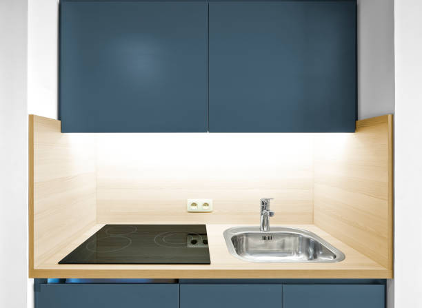 istock Mini kitchen with sink and glass cooker 1193534543