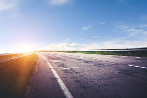 istock Panoramic road sunrise summer travel 1193534698