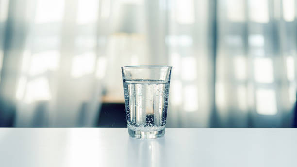 istock Pouring purified fresh water 1193534776