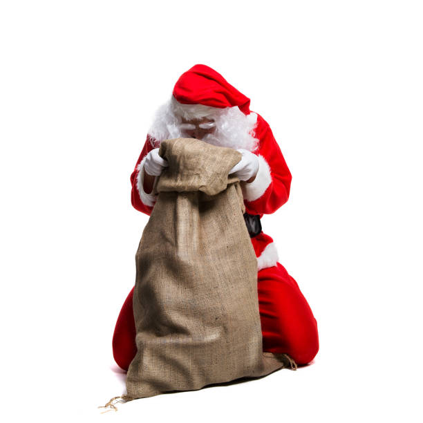 istock Santa Claus looking in his bag 1193538630