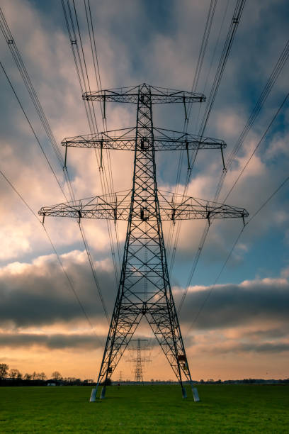 istock High voltage pylons in a beautiful landscape 1193538975