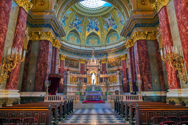 Interior of the St. Istvan Cathedral, Budapest, Hungary. Tourists look and photograph Interior of the Cathedral of St. Istvan. This is the most important church building in Hungary, one of the most significant tourist attractions and the third highest church in Hungary.
