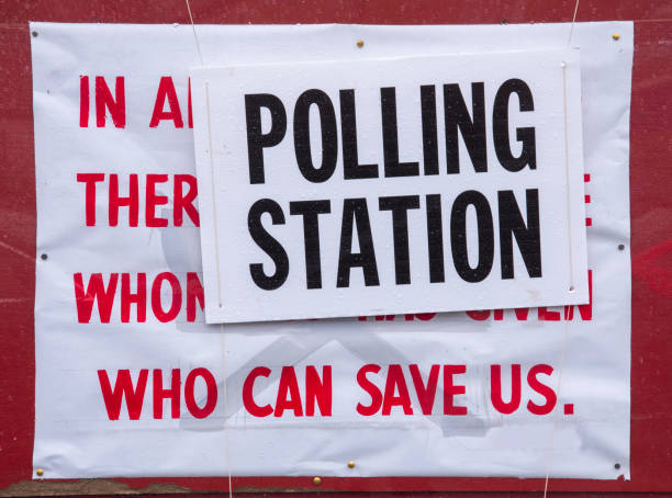 istock Polling Station sign with question for voters 1193540600