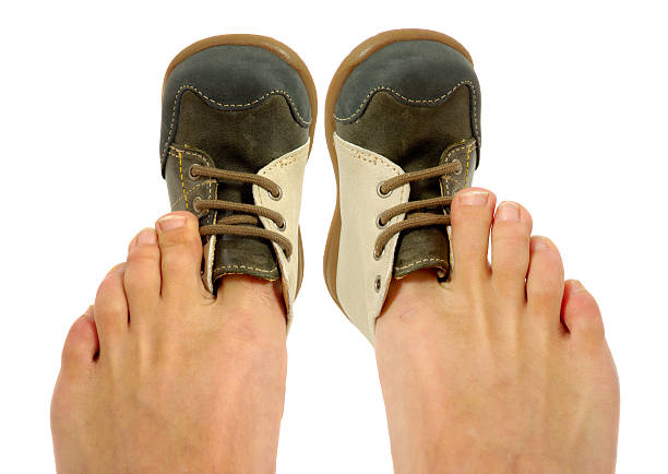Uncomfortable Shoes Stock Photo - Download Image Now - Too Small
