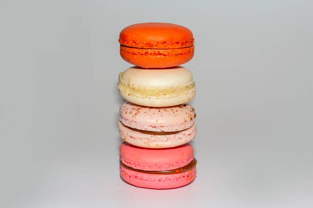 istock Colorful macaroni cakes on white background. Dessert 1193541646