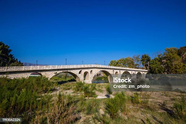 Gorica Bridge Over Osum River Berat Albania Stock Photo - Download Image Now - Albania, Ancient, Arch - Architectural Feature