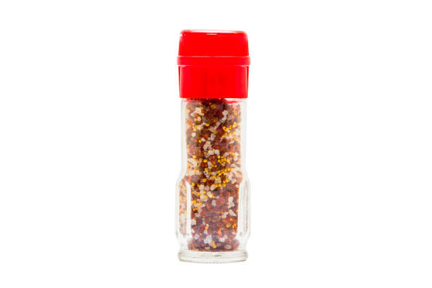istock Pepper and seasoning mill isolated on white background 1193543387