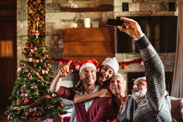istock taking a selfie at home for christmas 1193544195