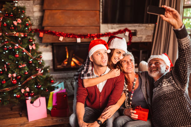 istock taking a selfie at home for christmas 1193544354