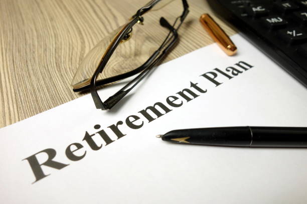 istock Retirement plan with calculator pen and glasses 1193546618