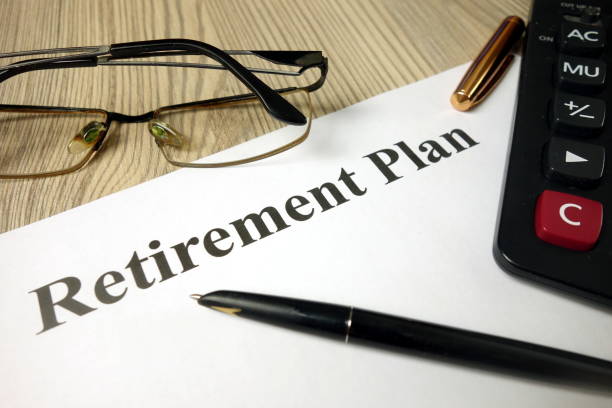 istock Retirement plan with calculator pen and glasses 1193547242
