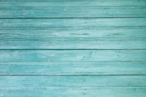Old blue-green colored wooden planks backdrop