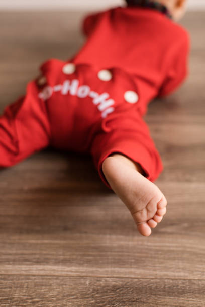 istock Baby in Red Christmas PJs 1193551665