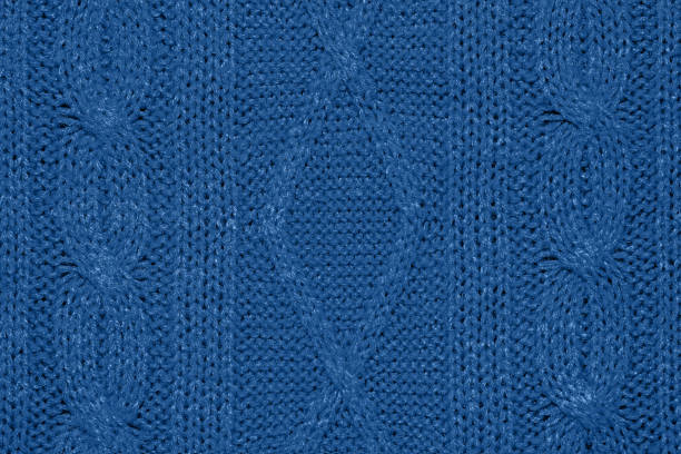 istock Large woolen background knitted from blue thread. View from above. 1193553203