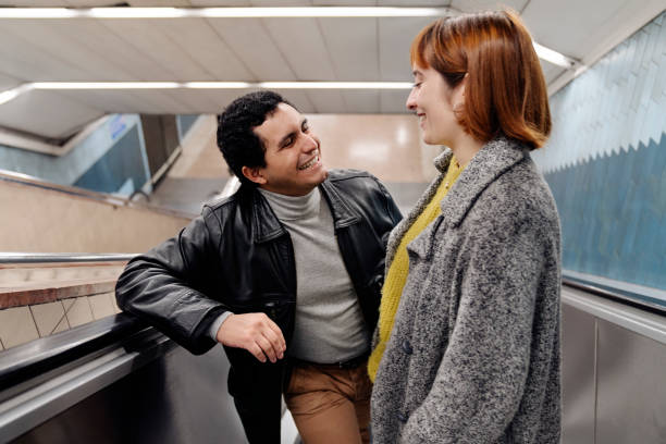 istock Happy couple looking at themselves and smiling 1193553424