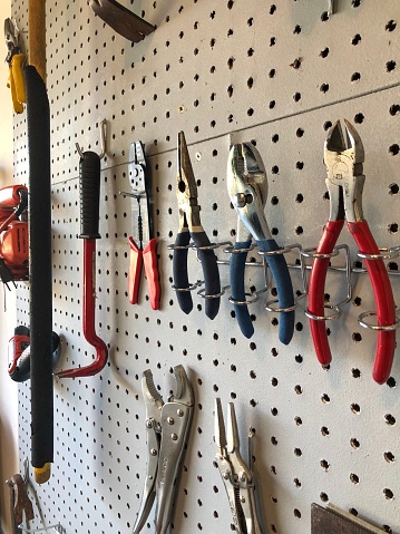Tool storage and organization in the garage using peg board