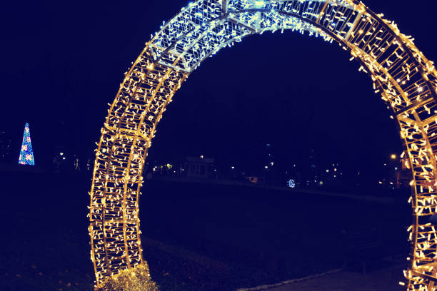 istock Christmas lights gold gate New Year background 1193557175