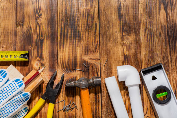 istock set of tools on a wooden background 1193560002