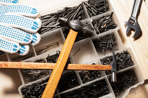 istock hammers and a box with nails. concept of home improvement. 1193560044