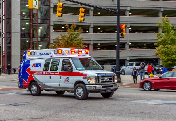 Grand Rapids, Michigan / USA September 29 2018:  An AMR (American Medical Response) ambulance drives through an intersection in Grand Rapids, Michigan.