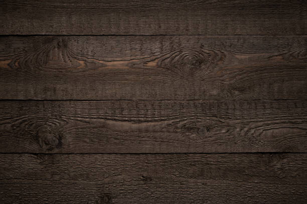 istock Dark brown old wood striped texture or background 1193564594