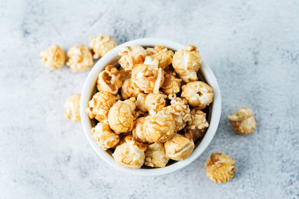 istock Caramel and chocolate sweet Popcorn in a white bowl 1193565109