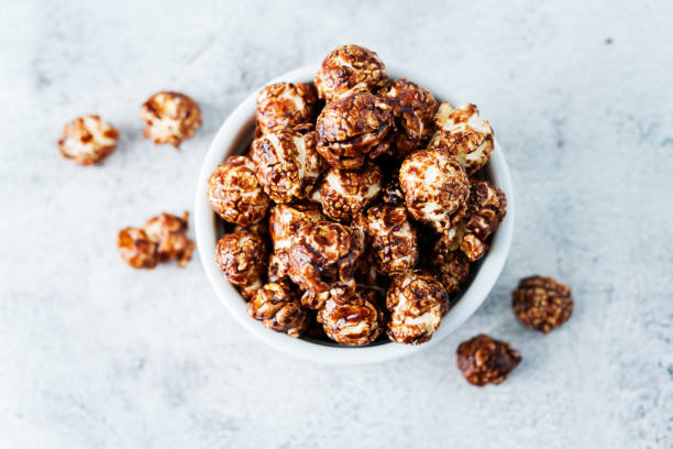 istock Caramel and chocolate sweet Popcorn in a white bowl 1193565124