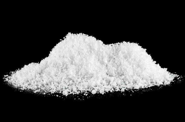 istock White snow on a black background, close-up. Snowy hills. 1193566655