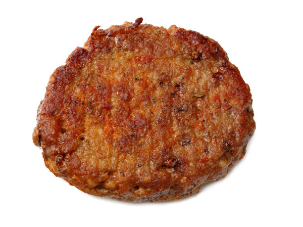 istock freshly grilled burger meat isolated on white background. top view 1193567411
