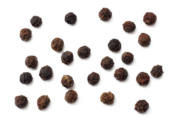 istock Black peppercorn isolated on white background. top view 1193567646