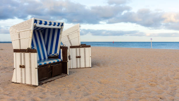 istock A pair of beach chairs at a deserted beach 1193567700