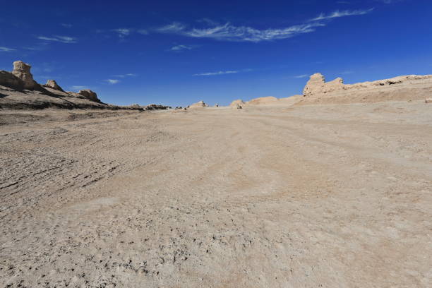 istock Cirrus uncinus-mares.tails clouds over yardangs-wind eroded rock surfaces. Qaidam desert-Qinghai-China-0588 1193567916