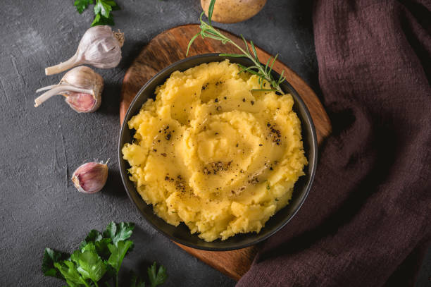 istock Mashed potatoes in bowl on wooden table 1193568839