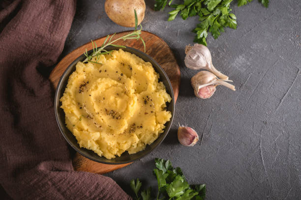 istock Mashed potatoes in bowl on wooden table 1193568867