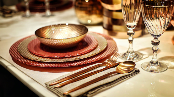 fine dining table setting in golden color theme