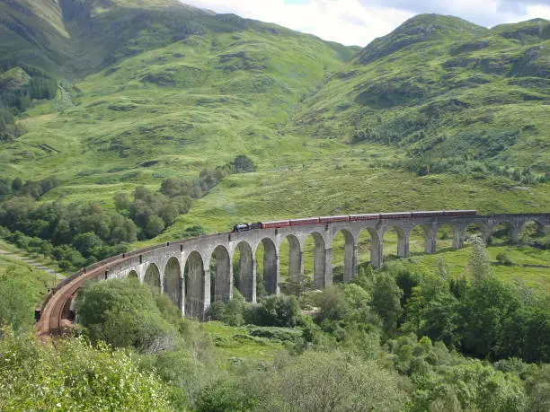 View to the popular bridge to Hogwarts in Scotland, knows from the Harry Potter films.