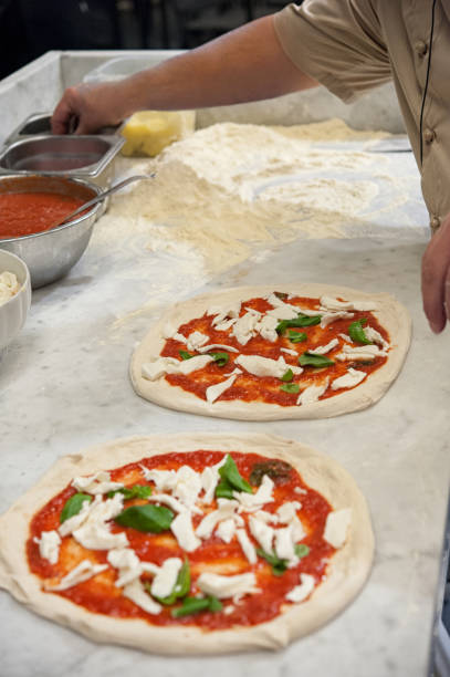 istock Preparing Pizza dought at the pizzeria. 1193572297