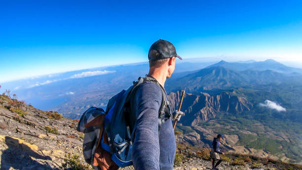 istock Bajawa - A couple dowing down the volcano Inierie 1193572800