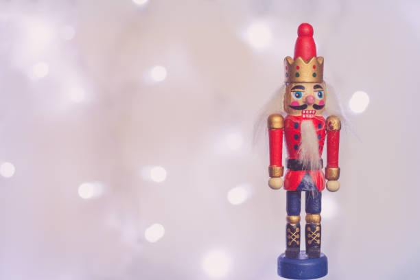 istock Wooden Nutcracker soldier Christmas decoration with sparkling  in background 1193575260
