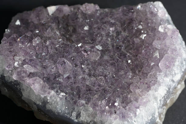 istock Quartz also called deep quartz with mineral inclusions in the studio in front of black background photographed in Marco mode 1193577760