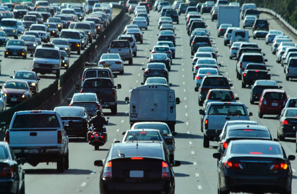 istock Crowded vehicle traffic and the only motorcycle in America 1193580310