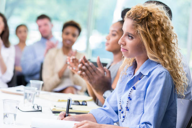 istock Attentive young businesswoman during conference 1193583570